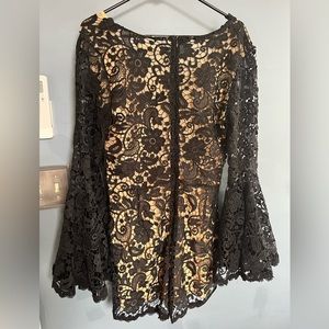 Julián Chang black lace romper with nude underneath . Very good condition.